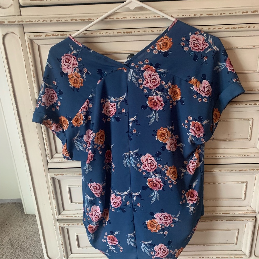 Woman’s floral blouse